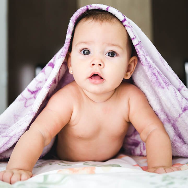 baby under blanket