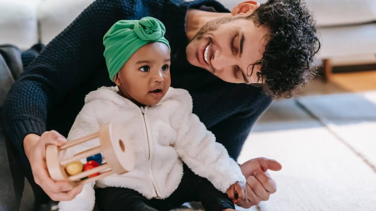 father and daughter smiling