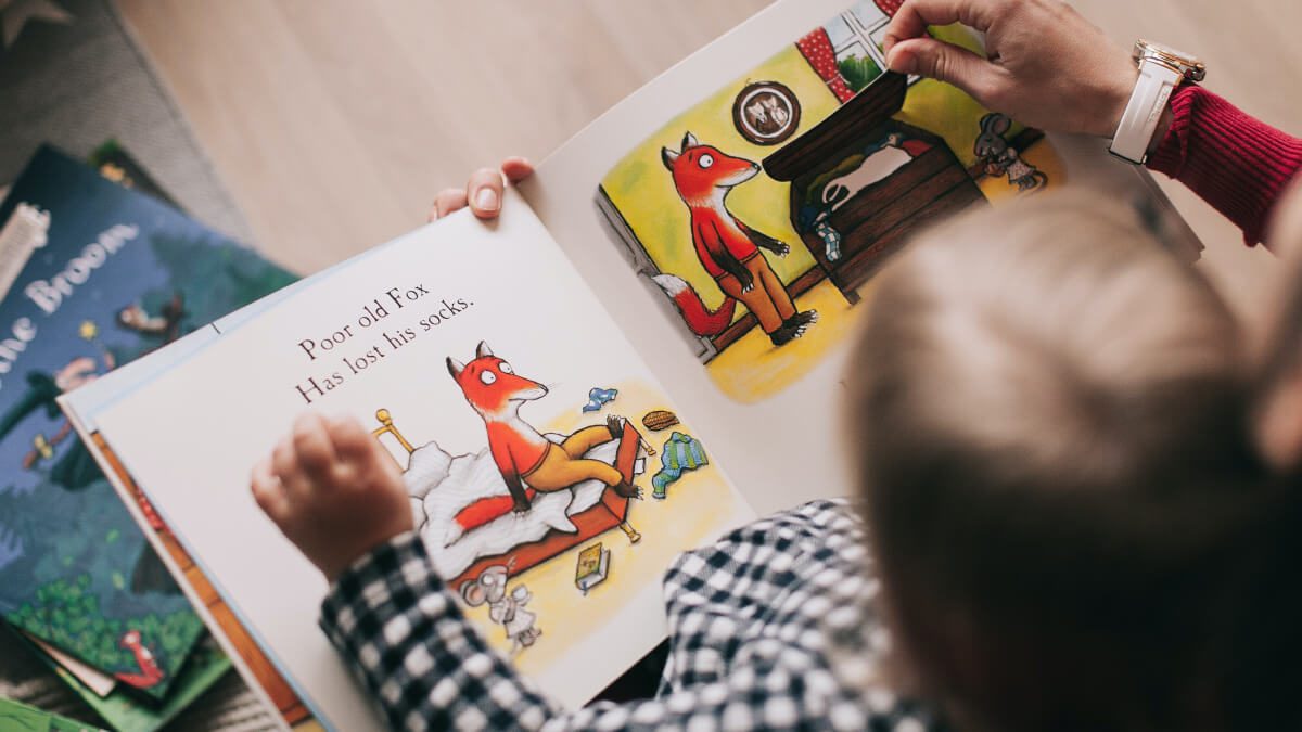 child reading book