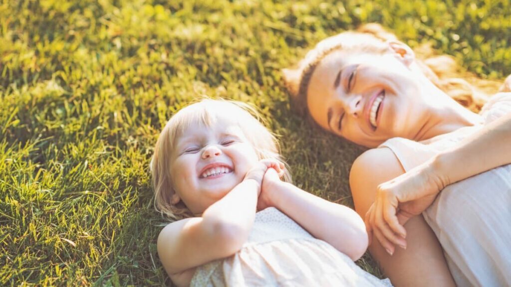 mother and child on grass