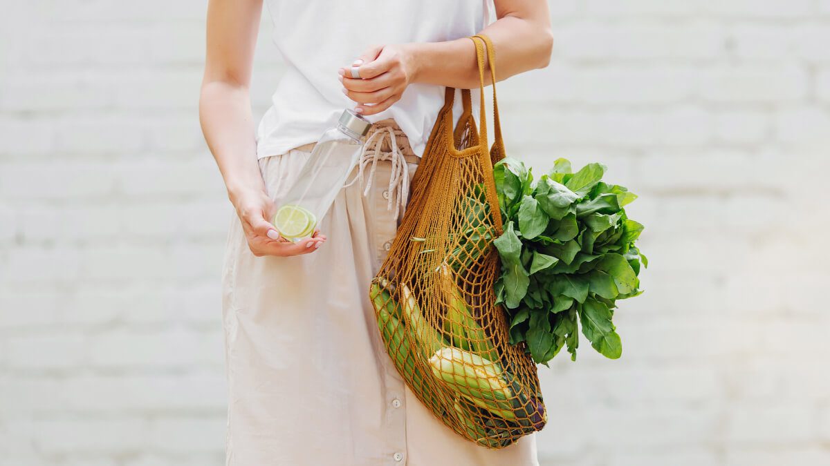 woman holding eco shopping bag