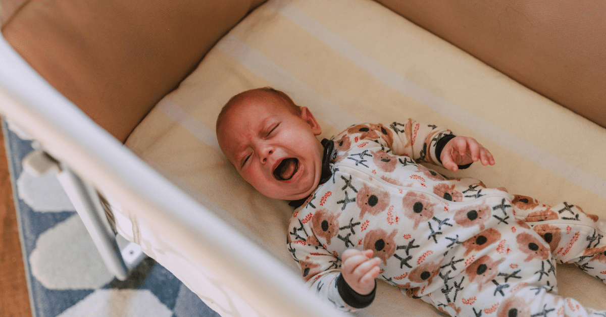 Baby crying in sleep: Causes and solutions for parents